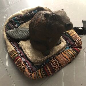 Fake marmot on backpacks